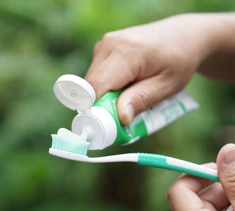 Creme dental com flúor